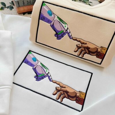 The Creation Toy Story Woody and Buzz Lightyear – Embroidered Sweatshirt